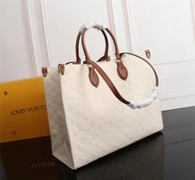 Load image into Gallery viewer, LOUIS VUITTON M44576 LV CARMEL HOBO BAG MAHINA LEATHER BEIGE. GM
